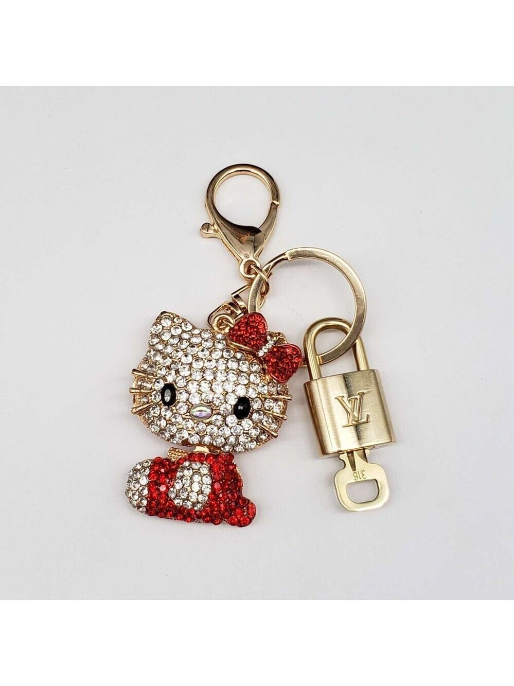 Louis Vuitton Gold Lock 🔒 Authentic LV Key + Unbranded Hello Kitty Bag Charm